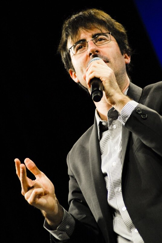 man speaking into microphone
