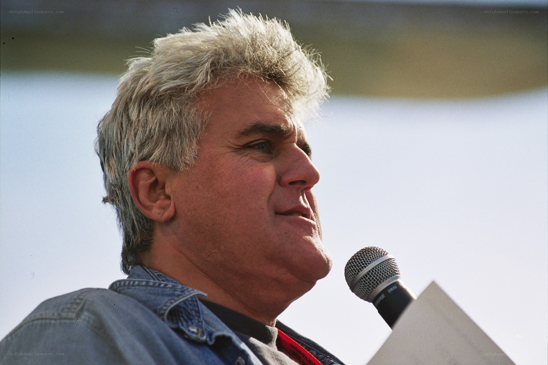 man speaking into microphone