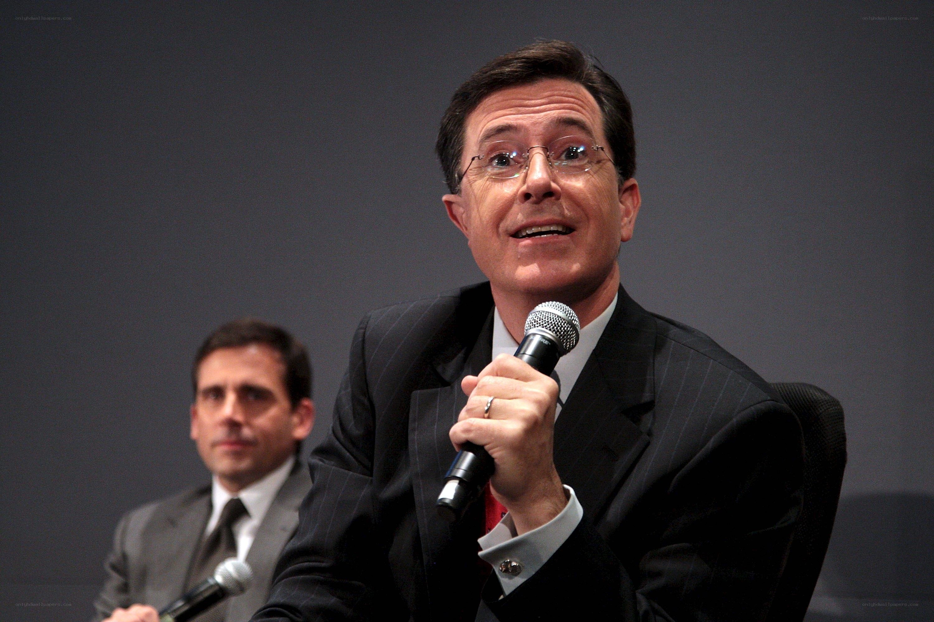 Man speaking into microphone at event