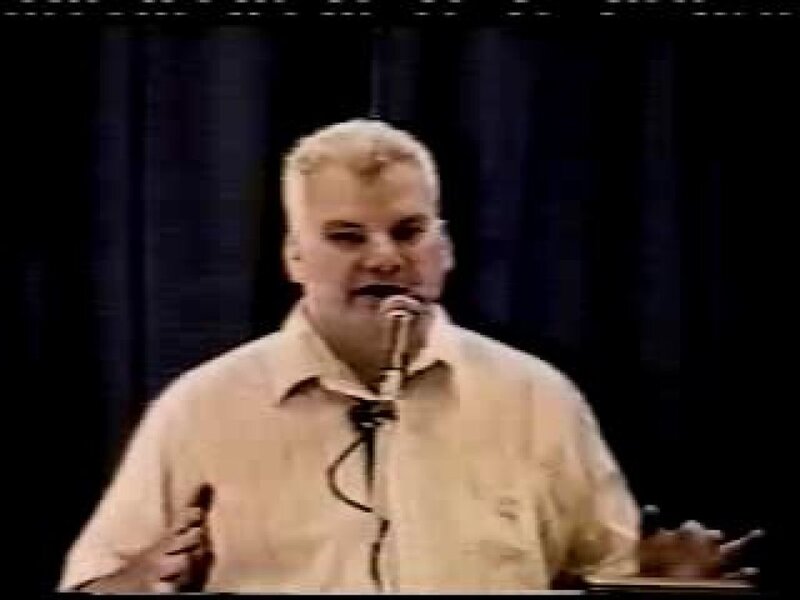 Man Speaking into Microphone — Beige