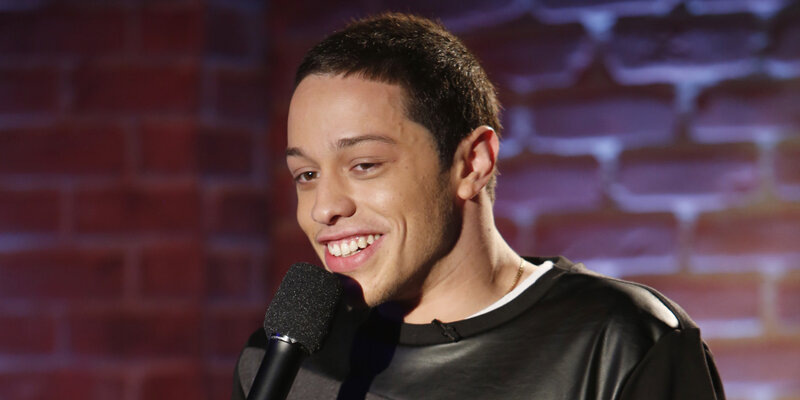 Man Speaking into Microphone — Black, Lighthearted