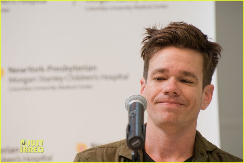 Man Speaking into Microphone — White
