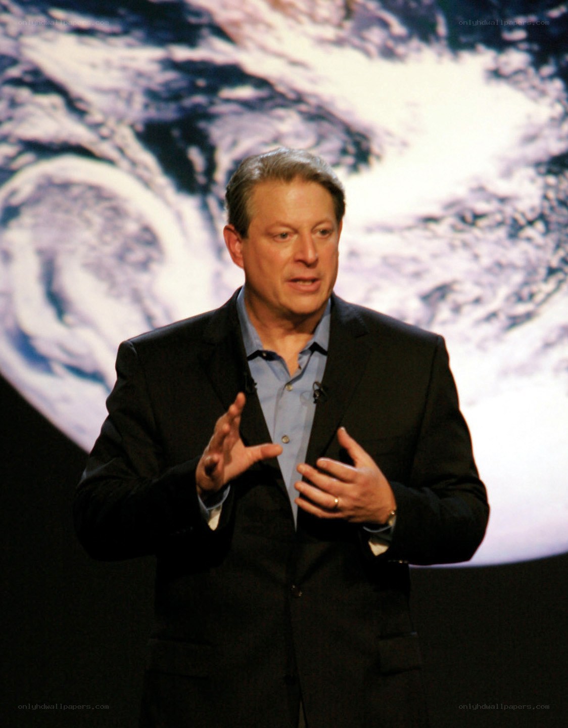 man speaking on stage