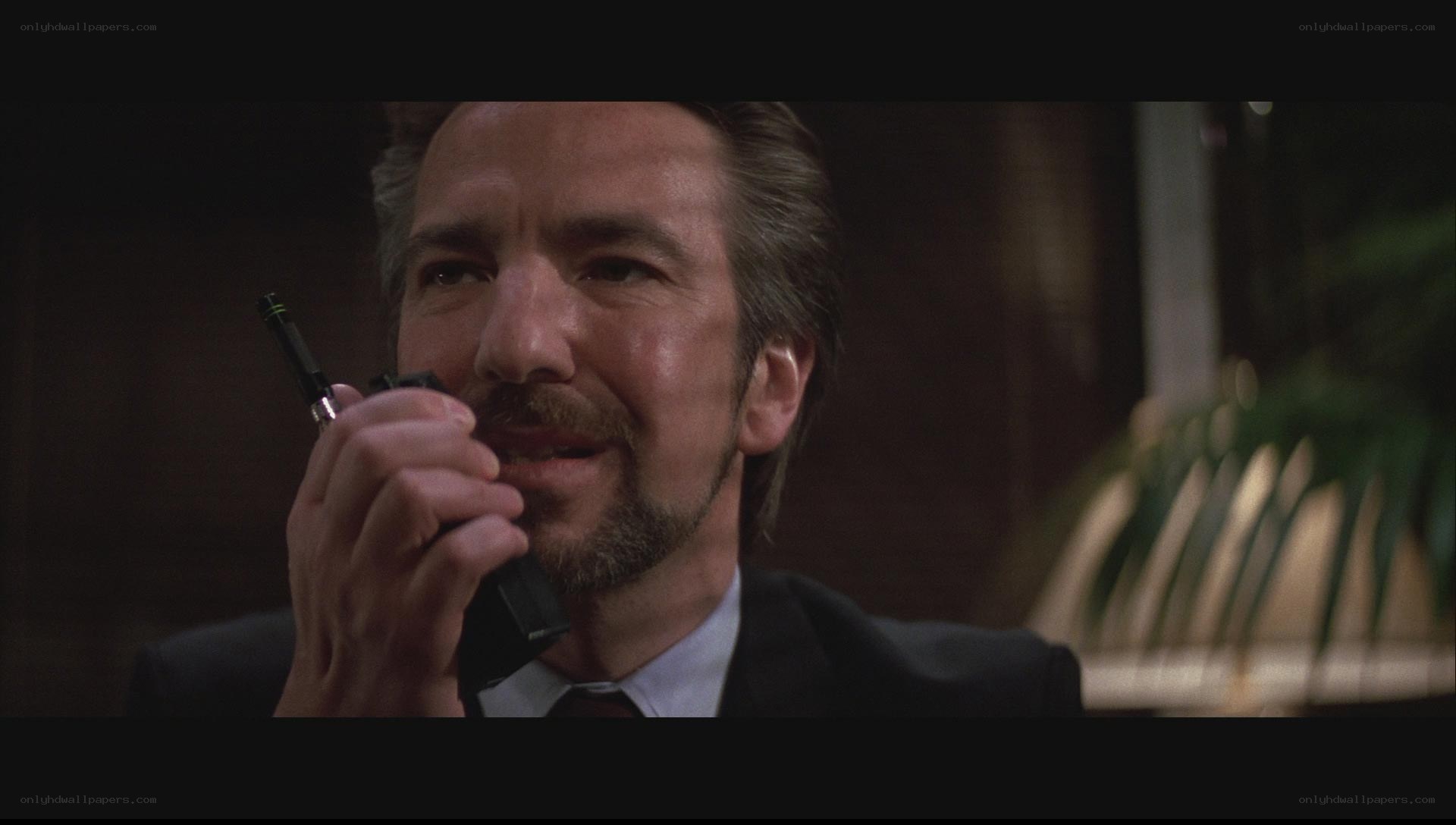 man speaking on walkie-talkie