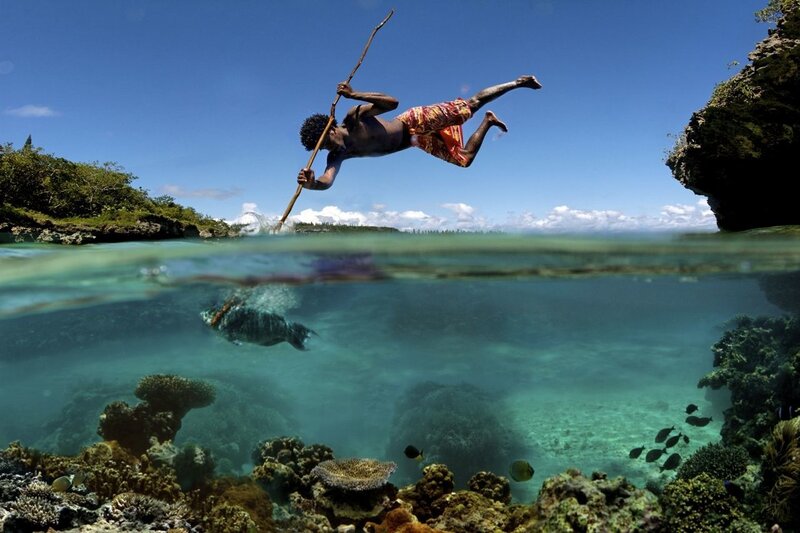 Man Spearfishing Underwater