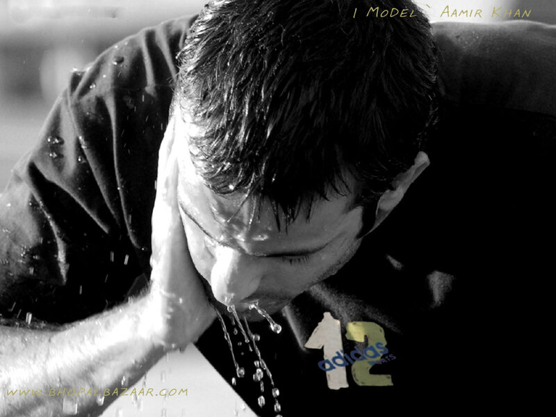 Man Splashing Water on Face