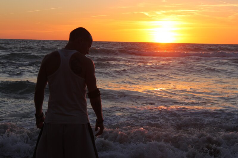 Man Standing at Ocean