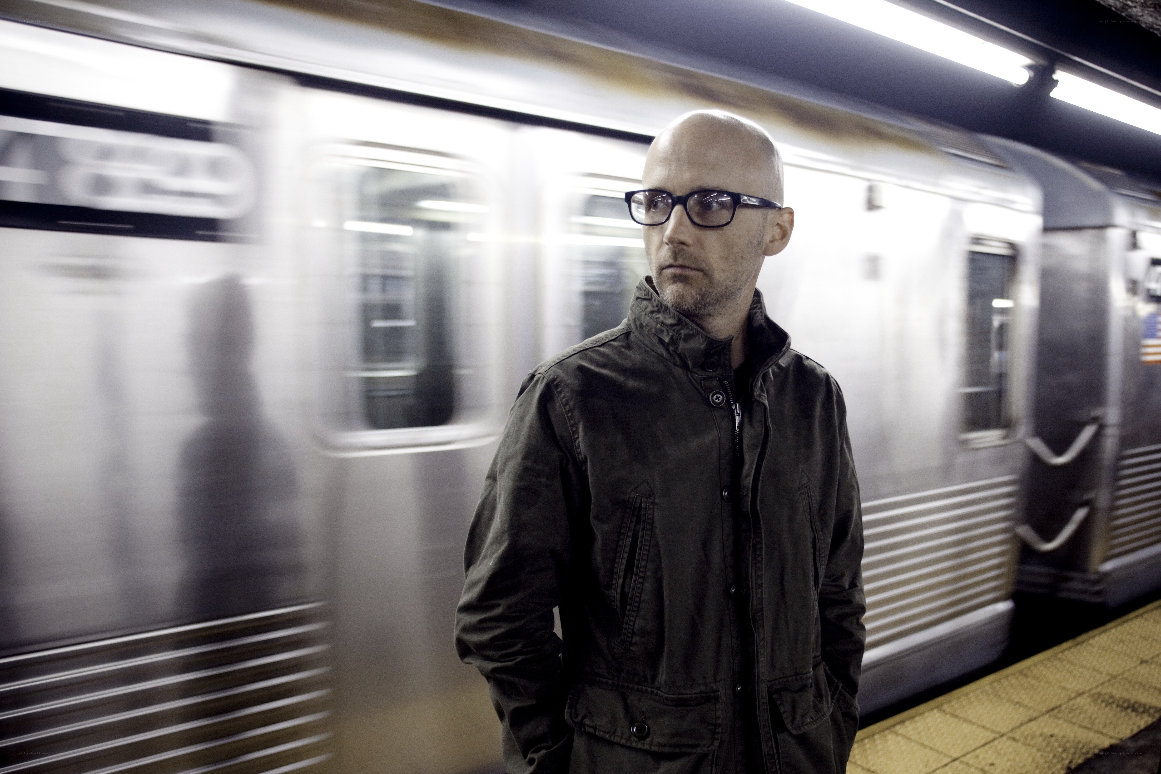 Man standing at subway station