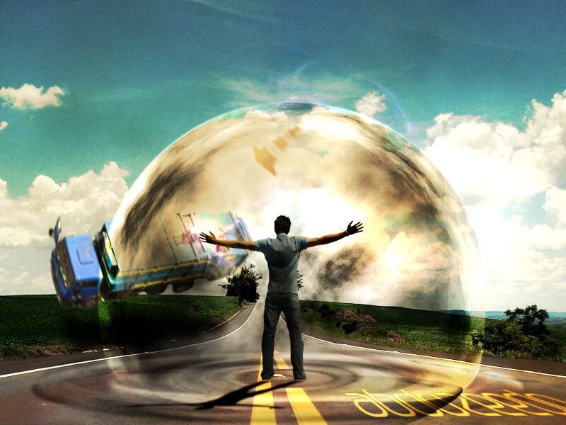 man standing before a bubble