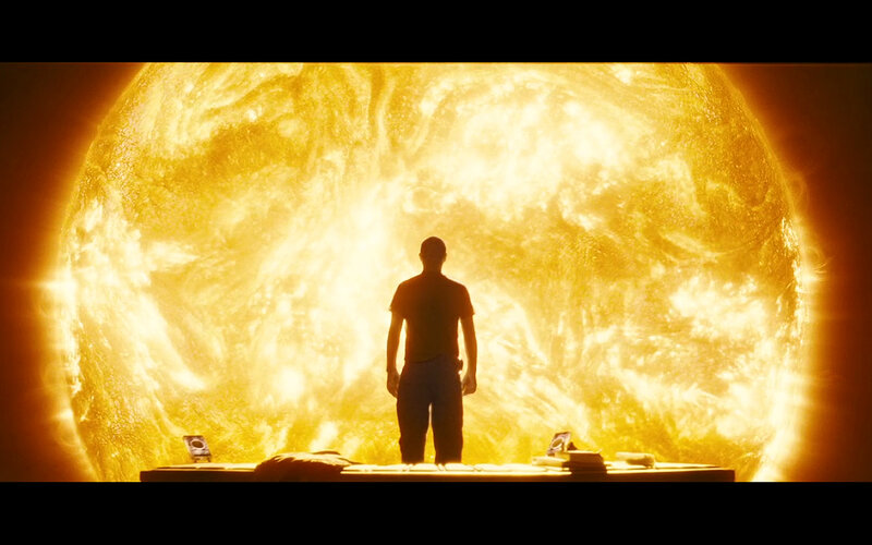Man Standing Before Sun