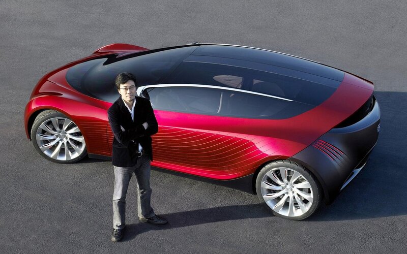 Man Standing Beside Car — Red, Dramatic