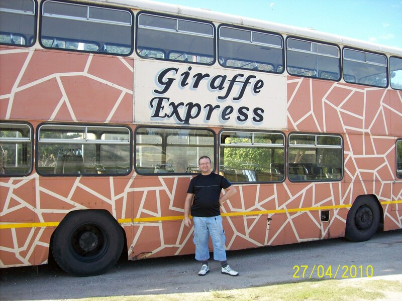 Man Standing by Bus