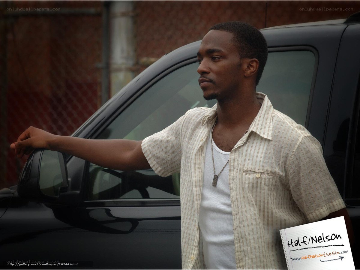 man standing by car