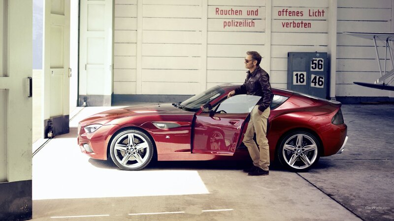 Man Standing by Red Car — Dramatic, Afternoon
