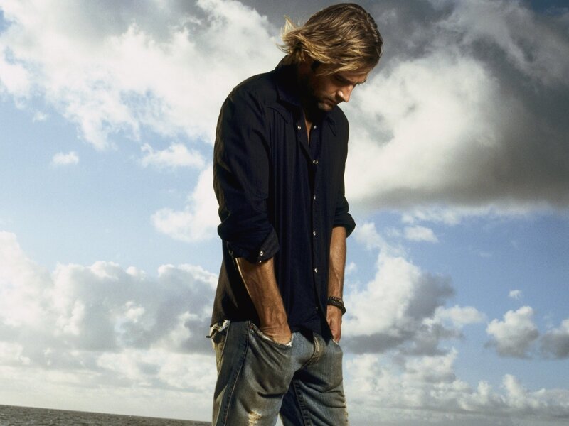 man standing by the sea