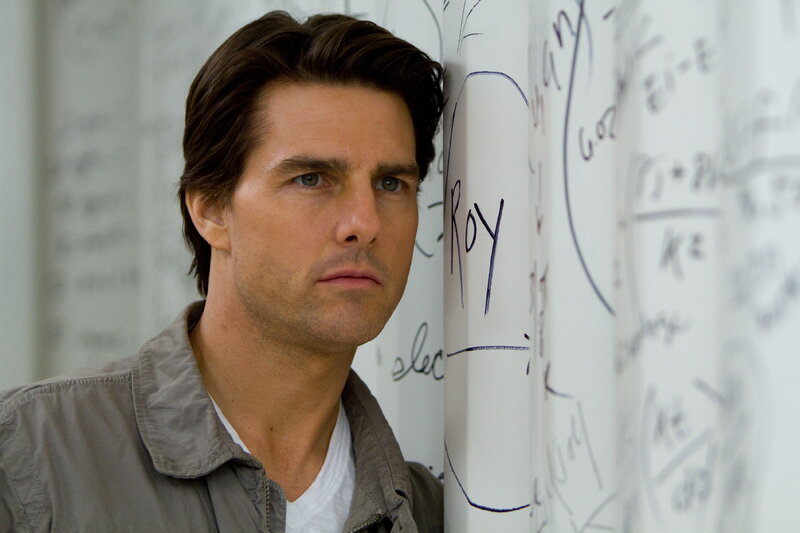 Man Standing by Whiteboard
