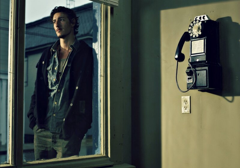 Man Standing by Window — Green
