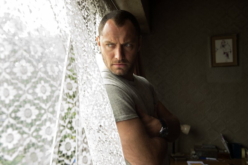 Man Standing by Window — White