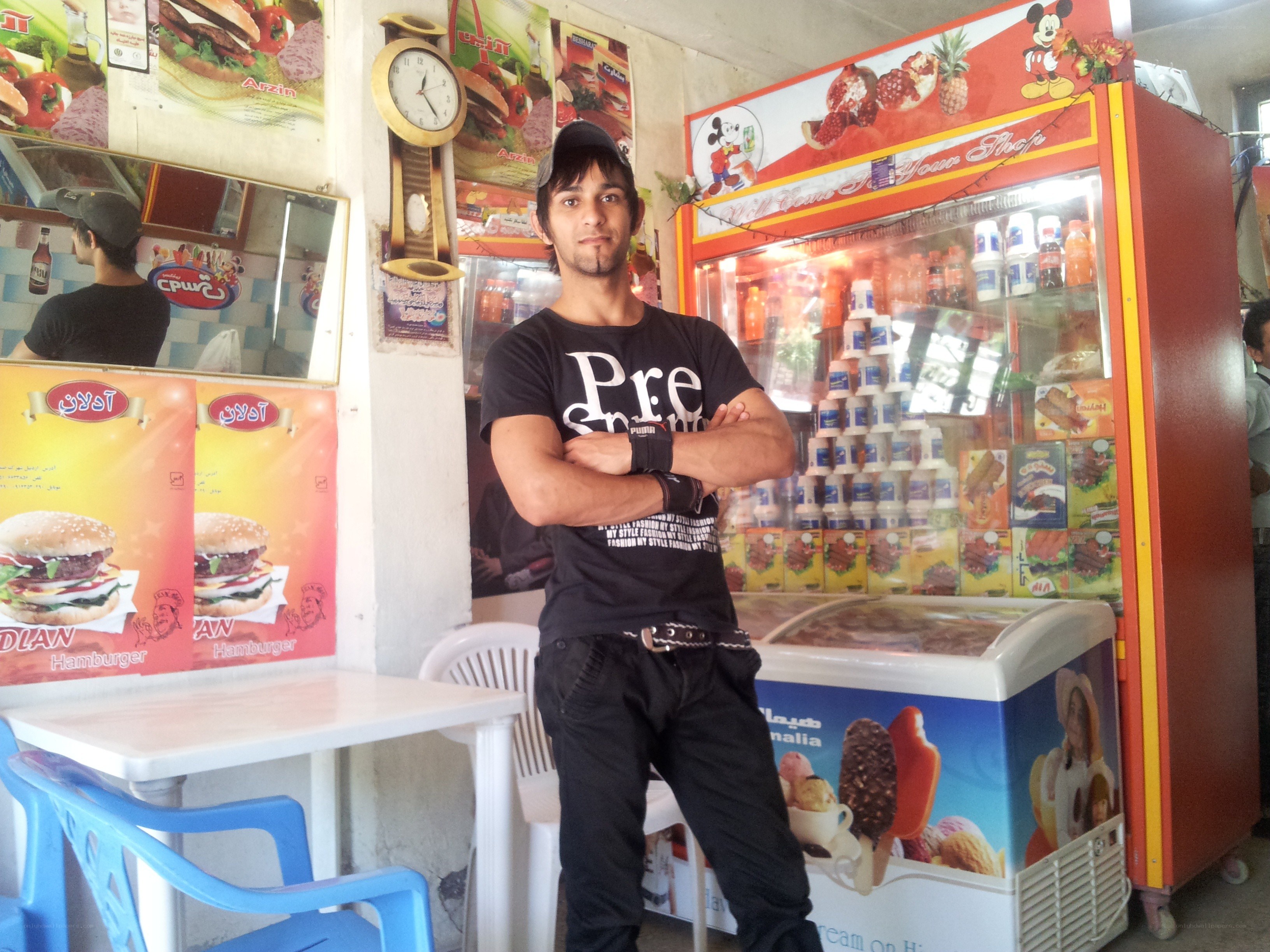 Man standing in a small shop