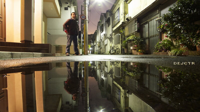 Man Standing in Alley — Black