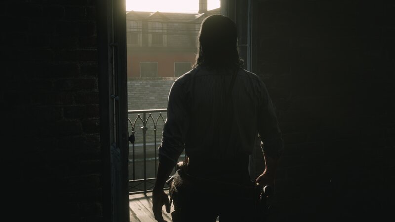 Man Standing in Doorway