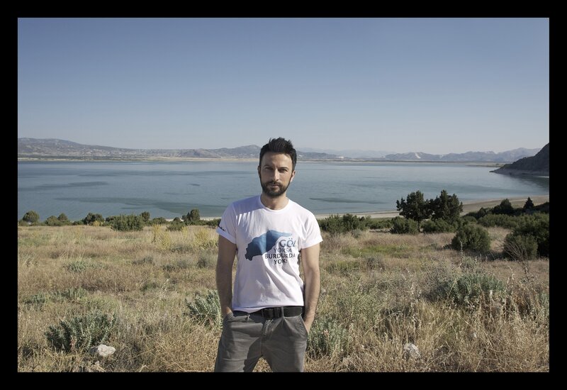 Man Standing in Field — White