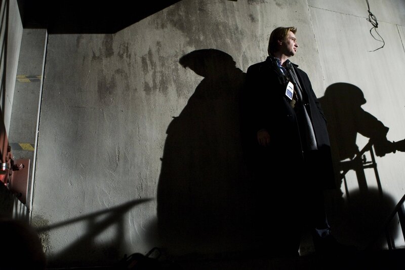 man standing in shadow