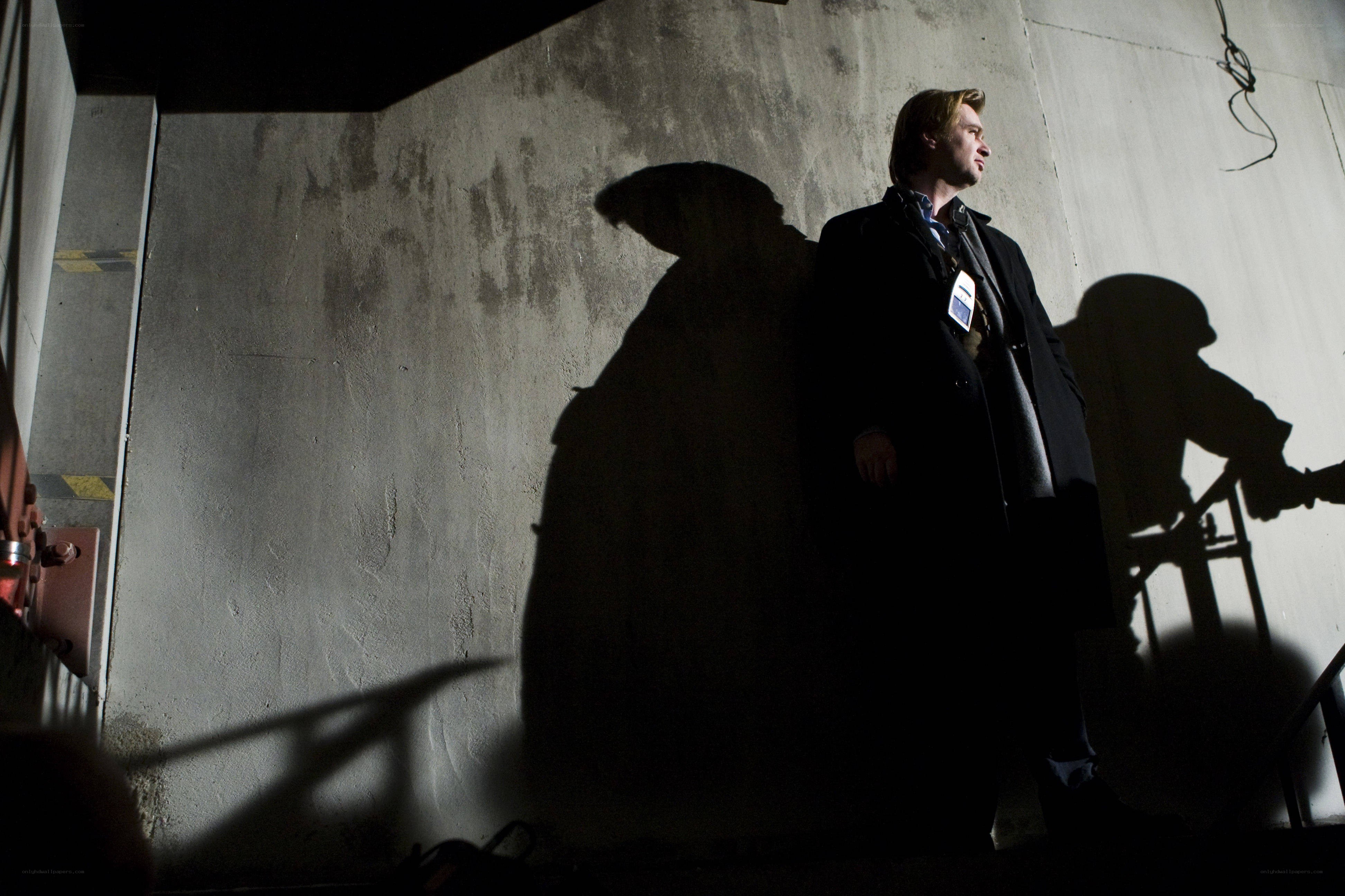 man standing in shadow