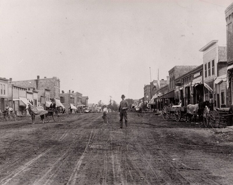 Man Standing in Street