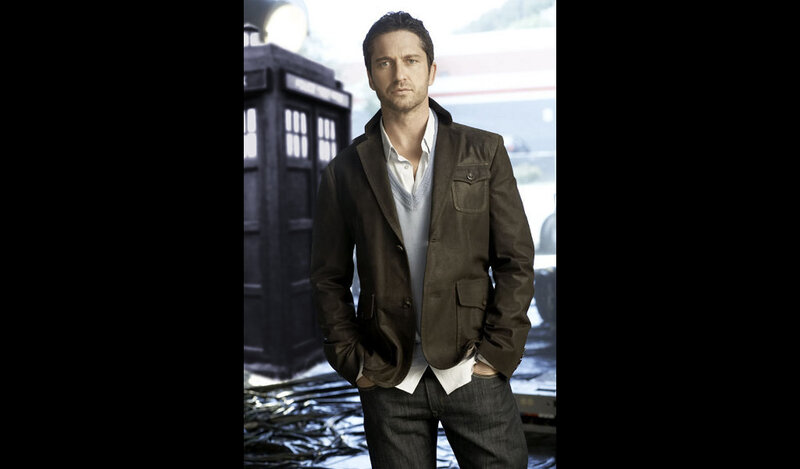 man standing near police box