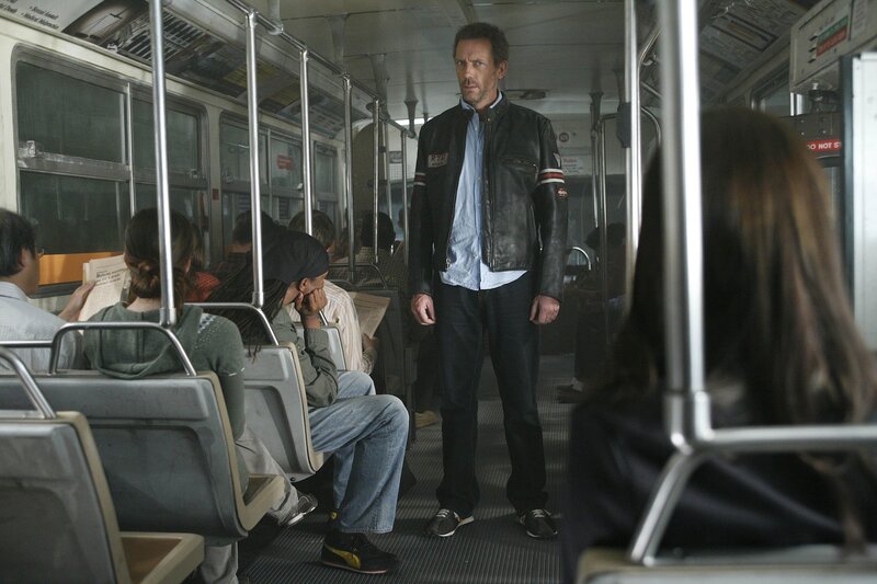 Man standing on a bus