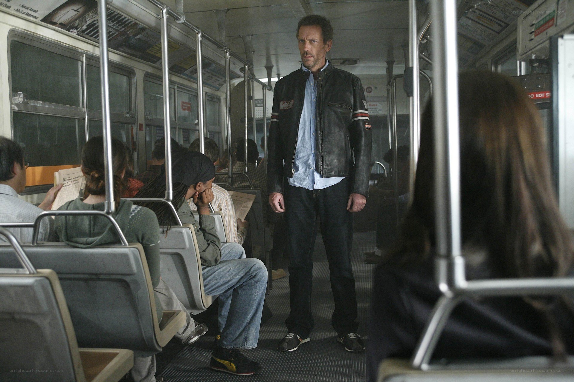Man standing on a bus