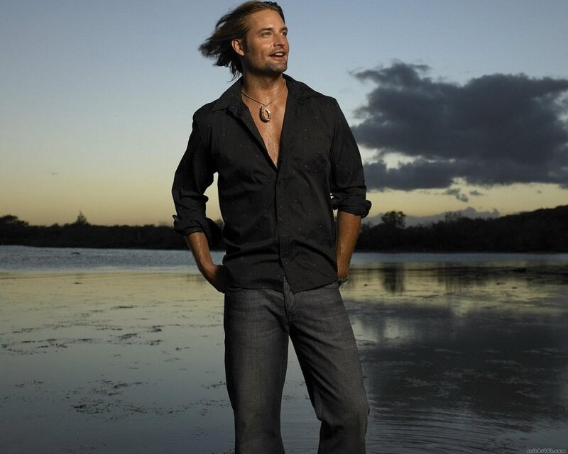 Man Standing on Beach — Black, Dramatic