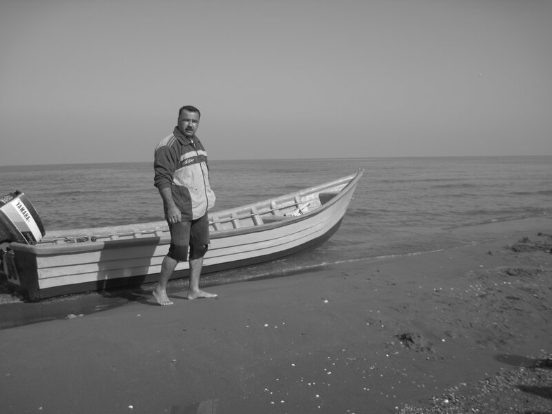Man Standing on Beach — Black