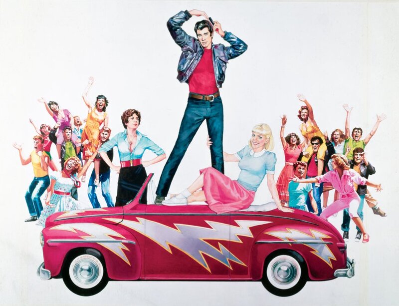 Man Standing on Car