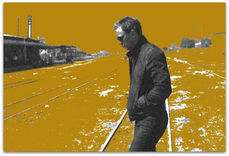 Man Standing on Tracks