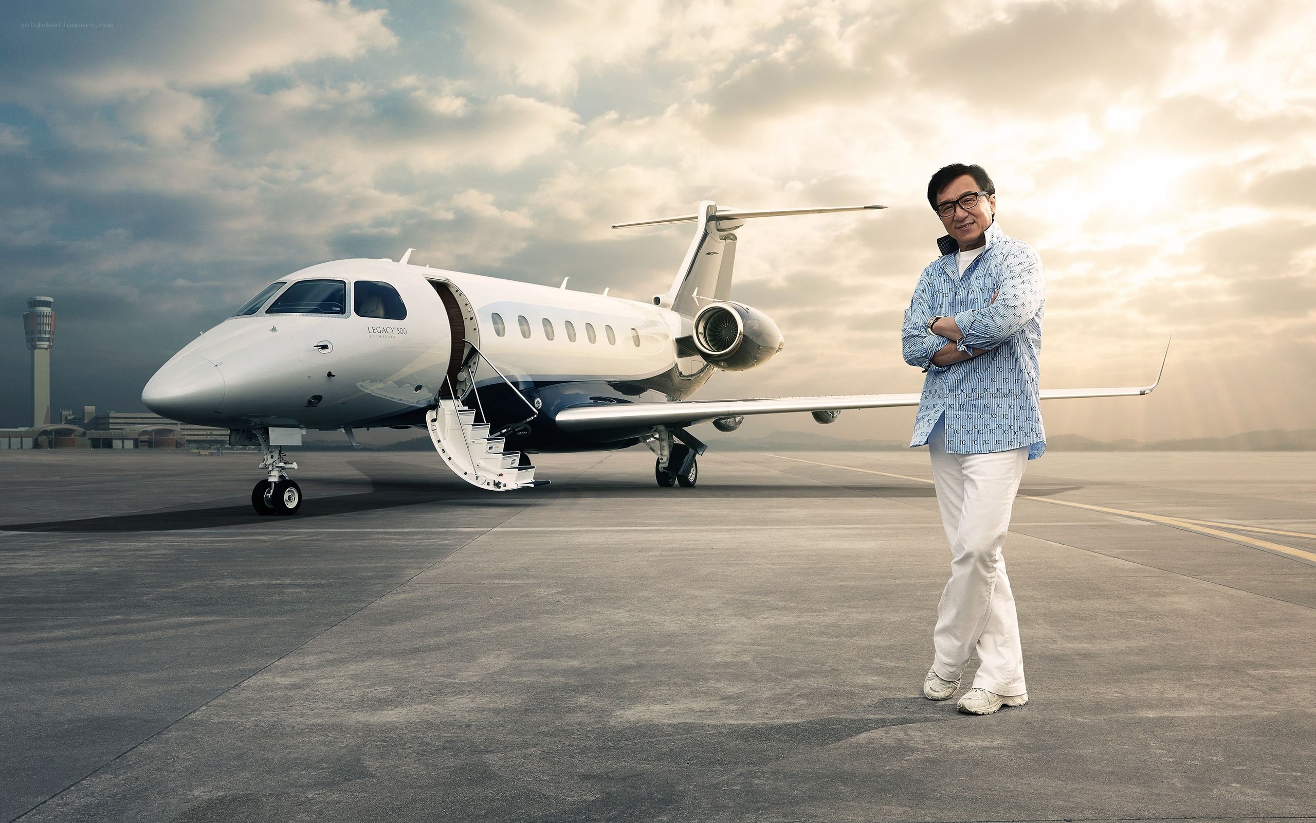Man standing with private jet