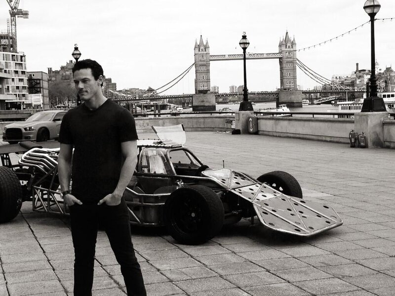 Man Standing with Race Car — Black