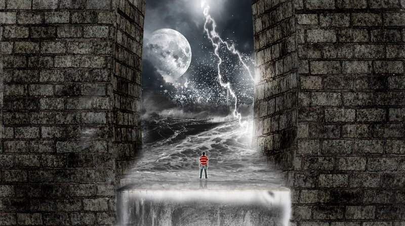 Man stands before stormy portal