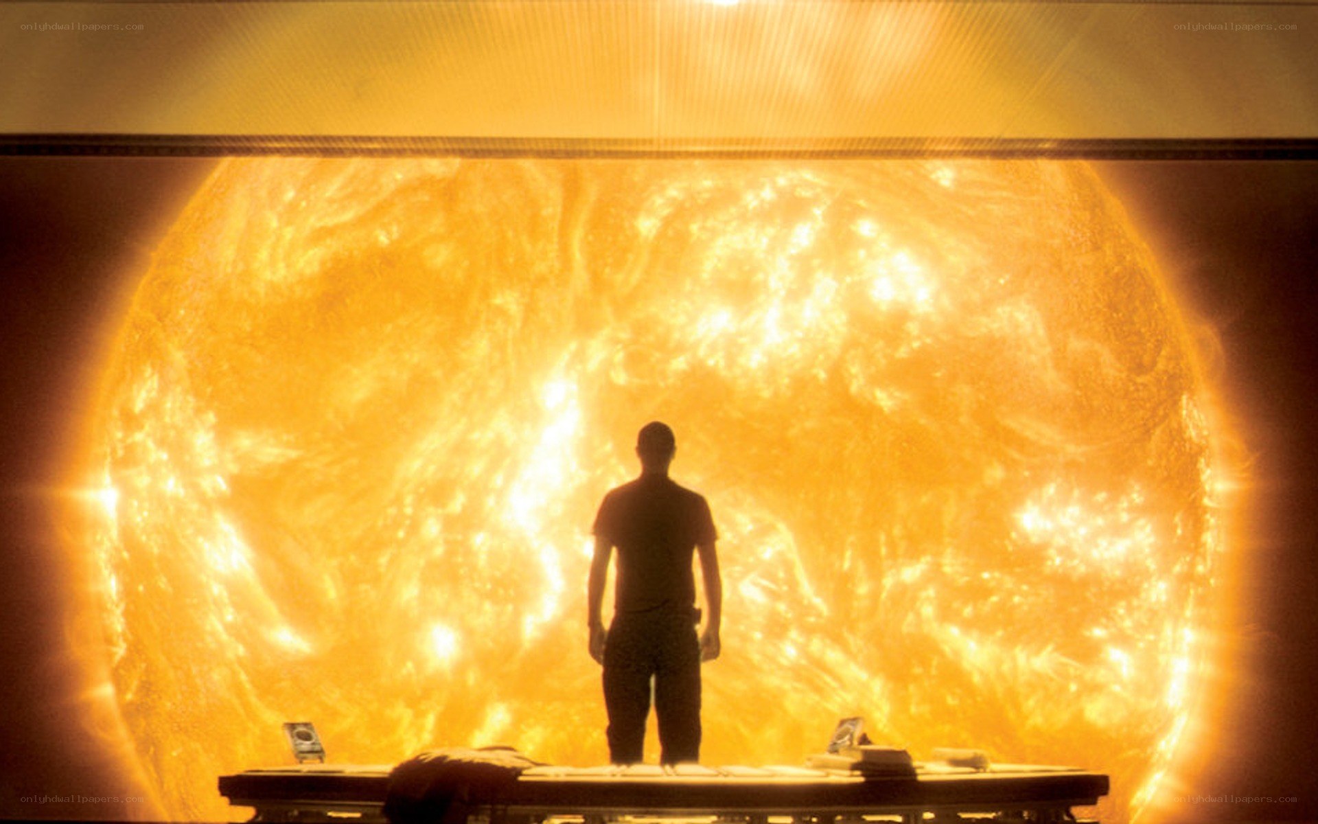 Man stands before the sun