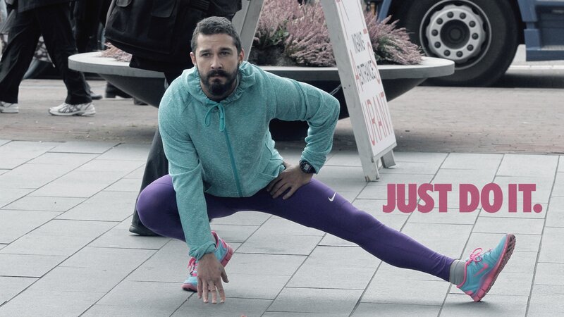 Man Stretching on Sidewalk