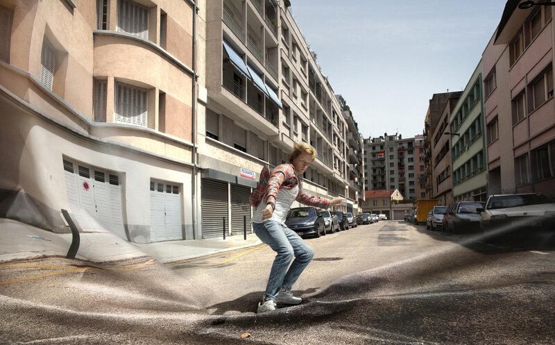 Man surfing on a city street