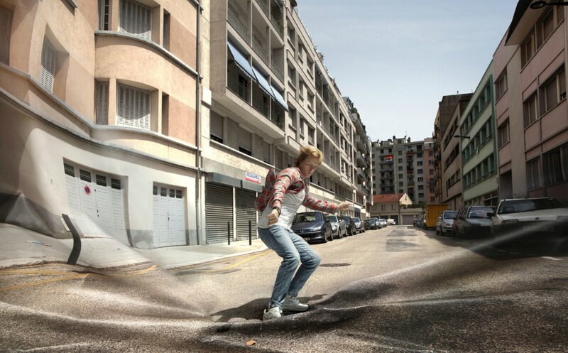 Man Surfing on Street