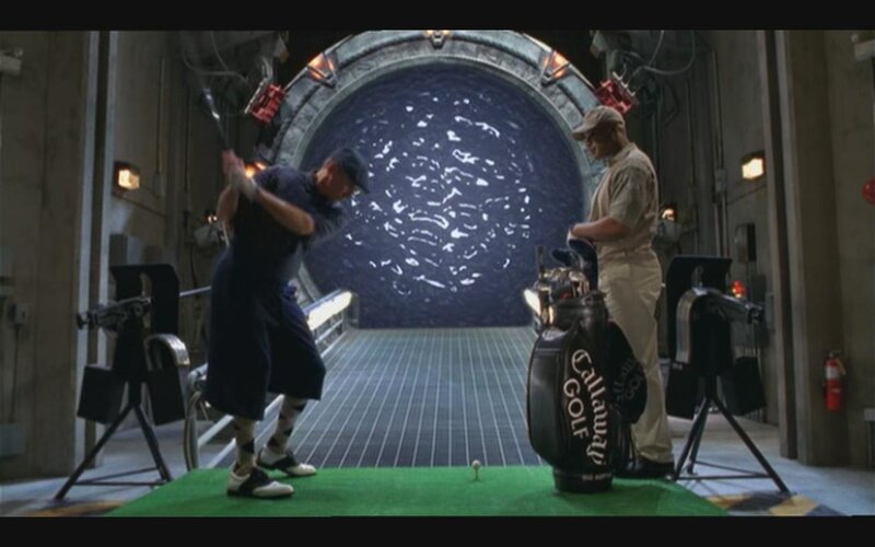 Man Swinging Golf Club — Green