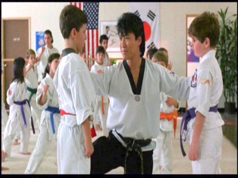 Man Teaching Children Karate