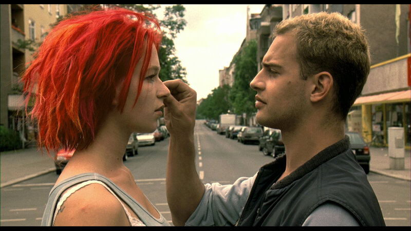man touching woman's face