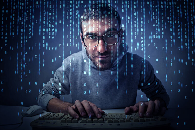 Man Typing on Keyboard