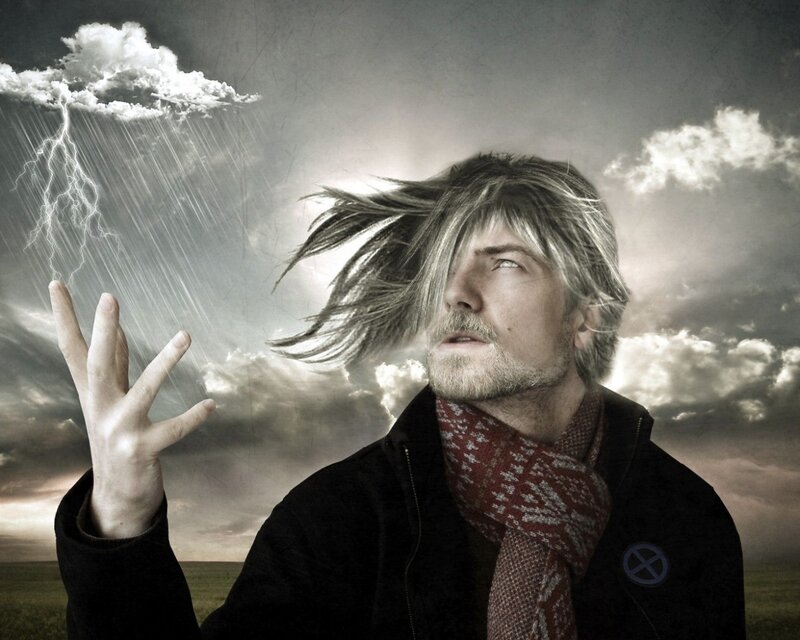 man under stormy sky