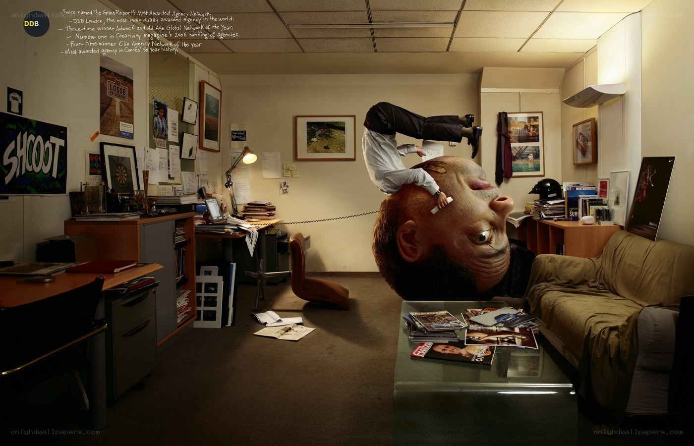 Man upside down in office
