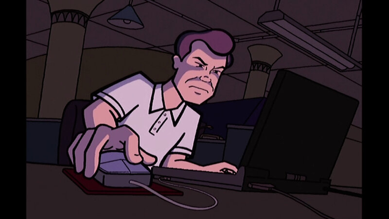 man using computer at desk
